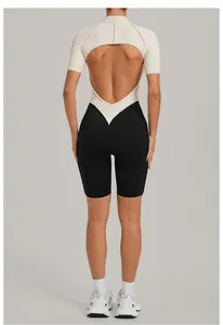 Back view detail of a chic color-block backless fitness jumpsuit for yoga and running.