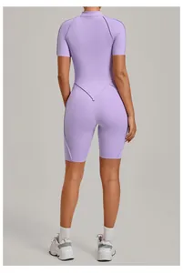 Back view detail of high-intensity purple short sleeve yoga romper with V-shaped waist seam design