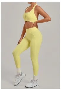 Detailed side view of yellow two-piece yoga set with zippered bra and high-waist leggings