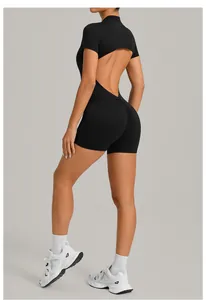 Back view of black backless yoga jumpsuit with butt-lifting scrunched seam detail