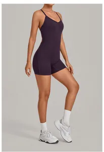 Close-up of deep purple V-neck one-piece yoga bodysuit with adjustable straps.