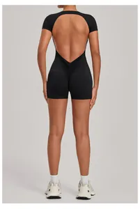 Detailed rear view of a black backless one-piece yoga bodysuit with scrunch butt feature