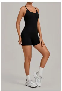 Detail view of black v-neck yoga bodysuit with adjustable straps for tummy control