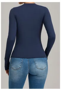Back view of a navy blue long-sleeve tight-fitting yoga top for high-intensity fitness