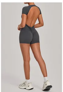 Detailed back view of a dark grey backless yoga jumpsuit featuring scrunch butt design.