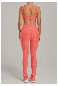 Back view detail showing the texture and adjustable straps of the coral red yoga set