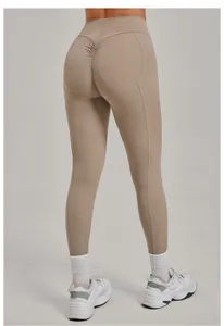 Leggings da yoga beige a vita alta con effetto scrunch sul retro