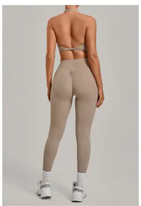 Detailed back view of a tan scrunch butt yoga set with halter bra and high waist leggings