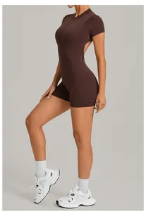 Elegant dark brown backless yoga jumpsuit with half-zip front and body-con fit for outdoor sports