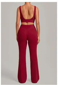 Back view of burgundy yoga set featuring U-neck sports bra and high-waisted flared pants