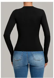 Back view detail of black slim fit long sleeve yoga top with high elastic fabric