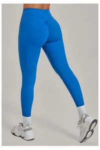 Vista posteriore di leggings da yoga blu a vita alta con effetto scrunch butt sportivi
