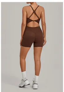 Detailed back view of a brown one-piece yoga romper with adjustable cross-back straps