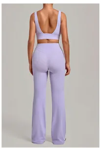 Back view of a lavender yoga set featuring a scoop back bra and flared pants outfit