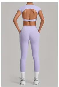 Back view of light purple yoga set with back cutout top and high waist leggings