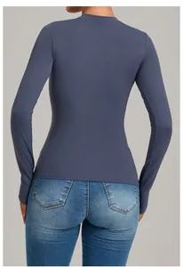 Detailed back view of a slim-fit blue-grey long-sleeved yoga top designed for fitness