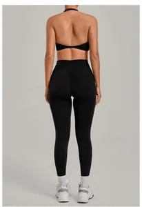 Back view of black scrunch butt leggings and halter sports bra yoga set for women