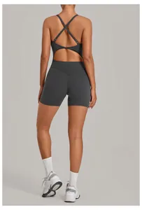 Rear view of dark grey one-piece yoga suit with adjustable cross straps