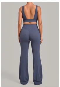 Back view of a two-piece yoga set featuring a sports bra and high-waisted flared leggings.