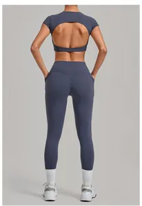 Back view of a high-waist yoga set with a cut-out sports top and side pocket leggings
