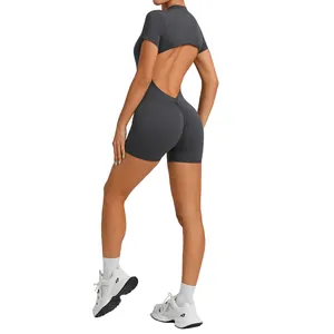 Sleek backless grey sports jumpsuit for yoga and fitness with scrunch butt detail