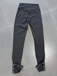Schlag-Yogahose mit hoher Taille und verstellbaren Druckknopfschlitzen am Saum