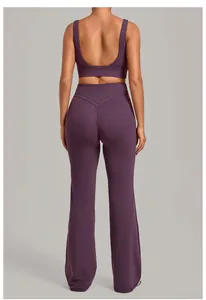 Rear view of purple yoga set featuring sports bra and flared high-waist pants