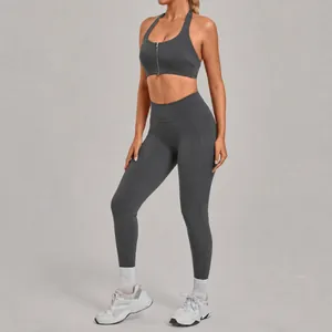 High-waist hip-lifting yoga set for women featuring zip-front sports bra in charcoal grey
