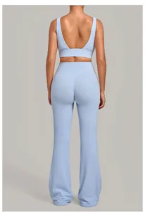 Back view of light blue yoga set featuring U-back sports bra and flare leggings outfit