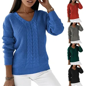 Multi-color cable knit V-neck sweater showing detailed texture in blue and other variants.