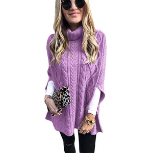 Gedetailleerd overzicht van de elegante paarse kabelgebreide coltrui poncho voor een herfstlook