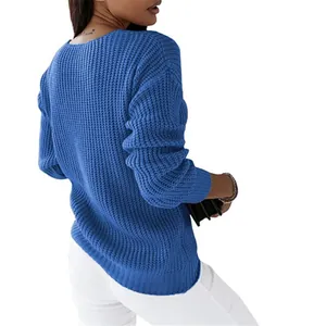 Detailed back view of a blue chunky waffle knit long-sleeved sweater for women