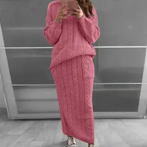 Cozy pink cable knit sweater and matching maxi skirt two-piece outfit for winter season