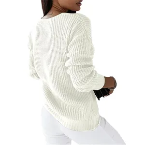 Back view of white V-neck long sleeve knit sweater with chunky textured ribbing
