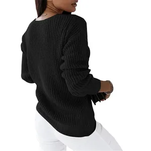 Back view of a black women's cable knit sweater with a deep V-neckline
