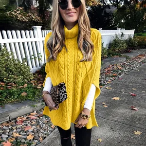 Oversized gele gebreide coltrui poncho trui voor dames in een elegante streetstyle-mode-look