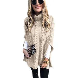 Gedetailleerde weergave van elegante beige coltrui poncho trui met kabelpatroon