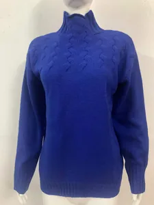 Detailed view of women's blue high-neck knitted sweater with textured cable pattern