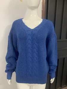 Close-up of a blue women's V-neck cable knit sweater on a mannequin showing texture