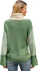 Detailed back view of women's thick green color-block turtleneck knit sweater pullover