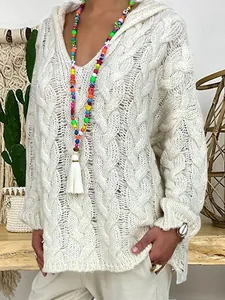 Detailed view of women's white cable knit hooded sweater with V-neck in cozy loose fit