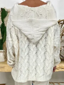 Back view of a cozy cream cable-knit hooded sweater for women in an oversized fit