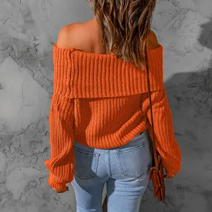 Back view of a stylish orange off-shoulder knitted sweater for women in loose fit