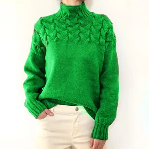 Detailed close-up of vibrant green cable knit high neck sweater showcasing soft texture