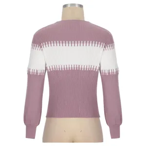 Back view detail of pink and white striped ribbed knit sweater with lantern sleeves.
