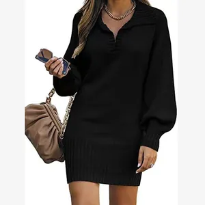 Elegant black knitted sweater dress featuring lantern sleeves and a stylish polo collar.
