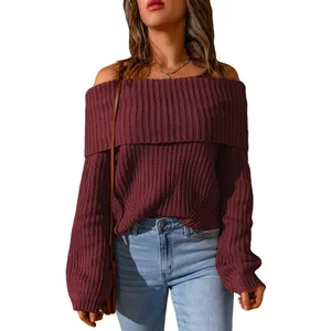 Close-up detail of burgundy off-shoulder ribbed knit sweater with fold-over neckline