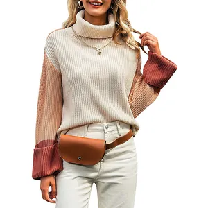Stylish women's color-block turtleneck knit sweater featuring warm beige and earthy brown tones.