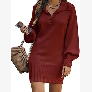 Detailed view of burgundy knit sweater dress with elegant lantern sleeves and lapel collar.