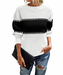 Detail of a color-block striped knit sweater with lantern sleeves and round neck.